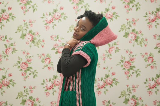 striped hooded green and pink vest