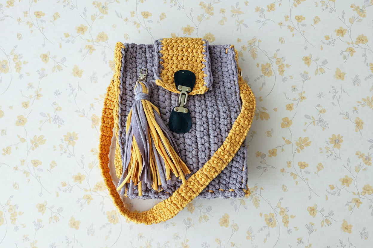 yellow grey crocheted handbag