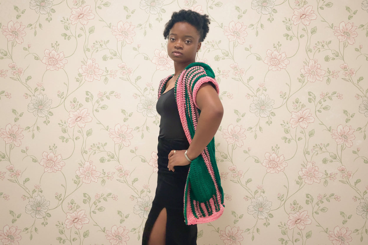 striped hooded green and pink vest