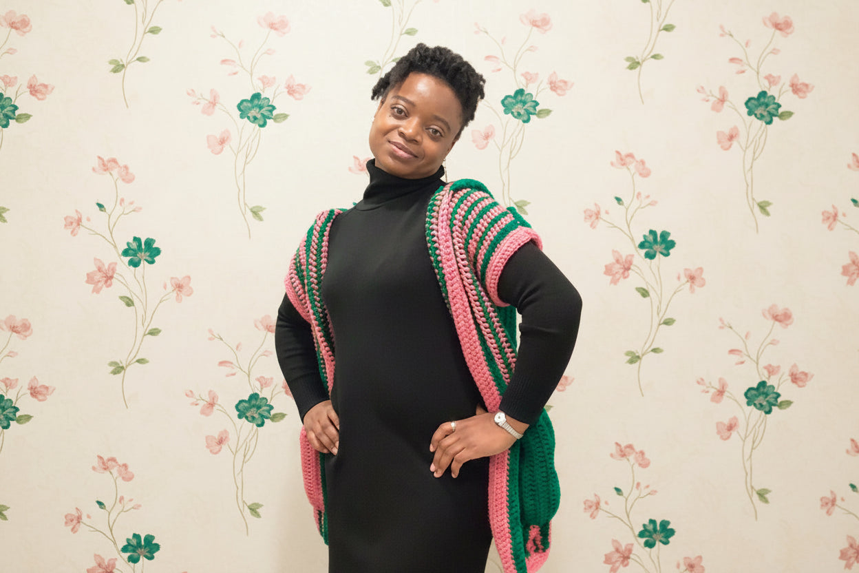 striped hooded green and pink vest