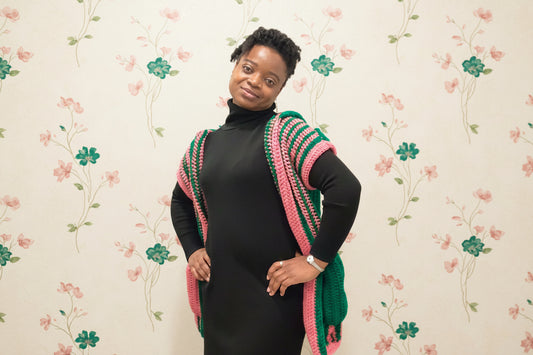 striped hooded green and pink vest